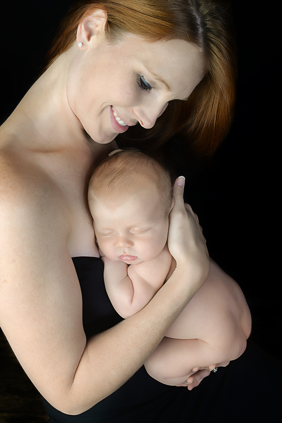 st-louis-newborn-photographer-four-fireflies-photography-7-week-boy-with-mom-on-black-background.jpg