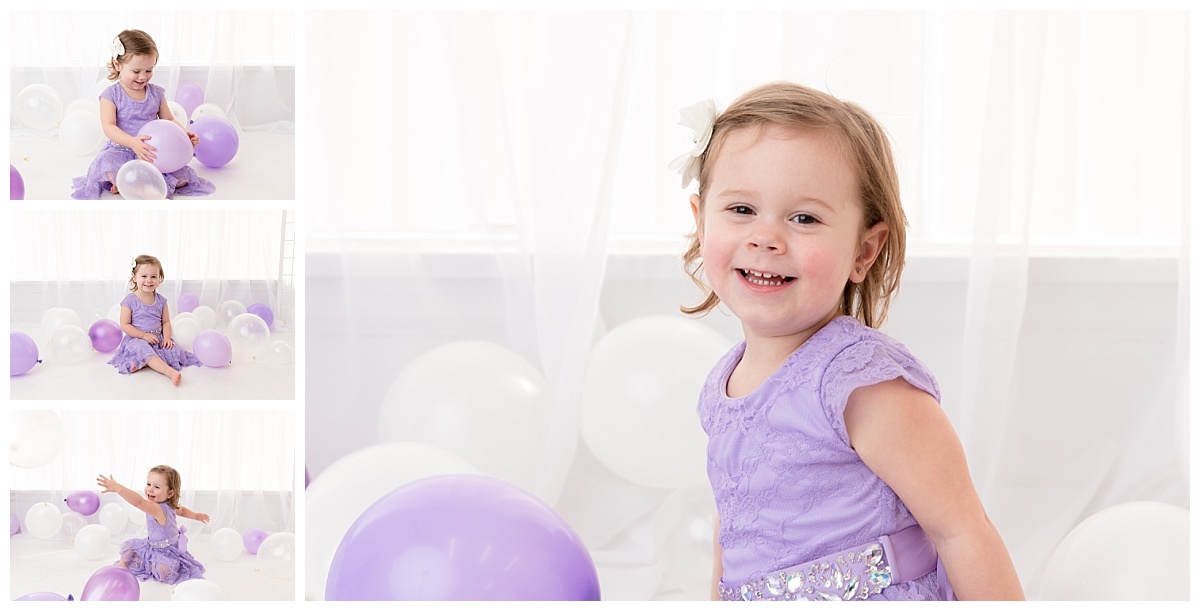 st-louis-birthday-photographer-three-year-old-girl-in-white-room-with-purple-balloons.jpg