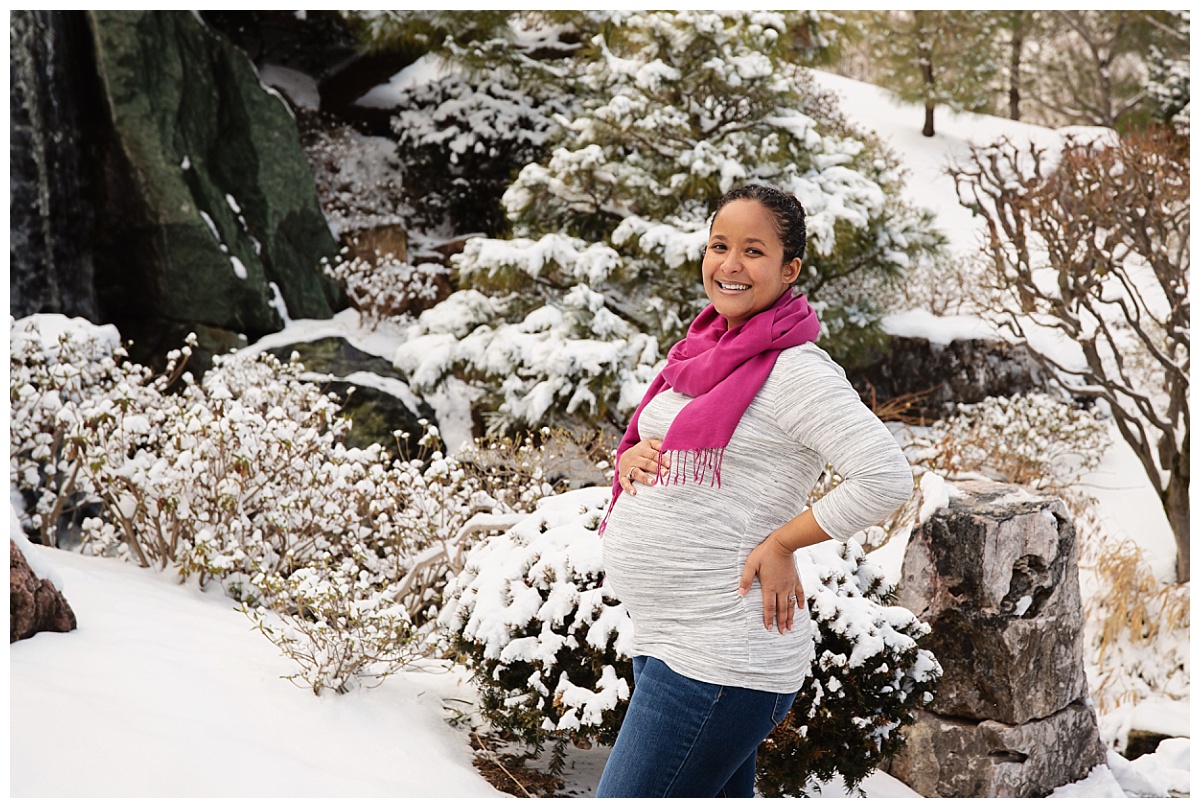 st-louis-maternity-photographer-in-the-snow-mom-with-pink-scarf-at-missouri-botanical-gardens-mobot.jpg