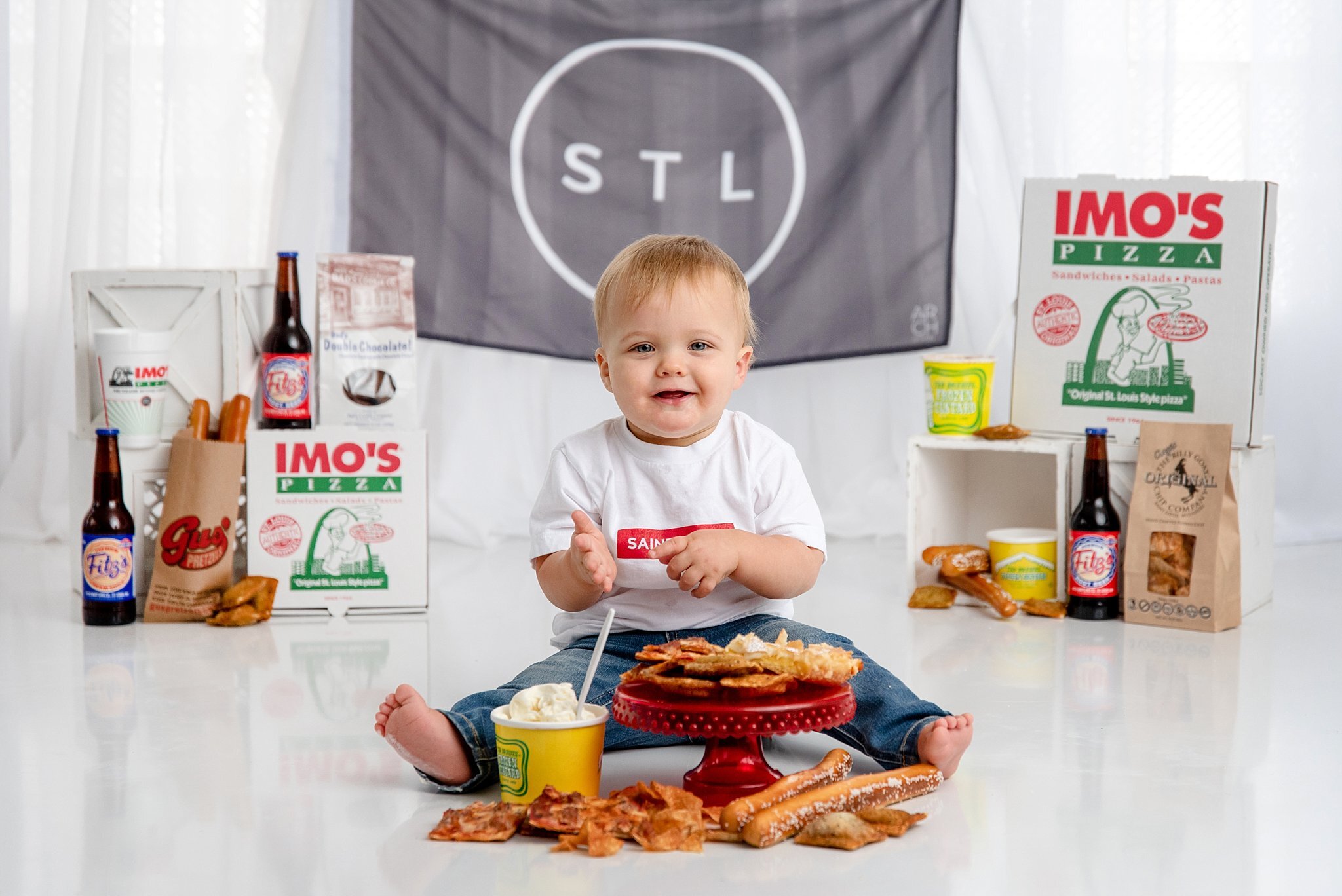 st-louis-baby-photographer-cake-smash-with-st-louis-foods-from-ted-drews-imos-gus's-pretzels-billy-goat-chips-grandpas-cookies-fitzs-budweiser-schnucks-arch-apparel.jpg