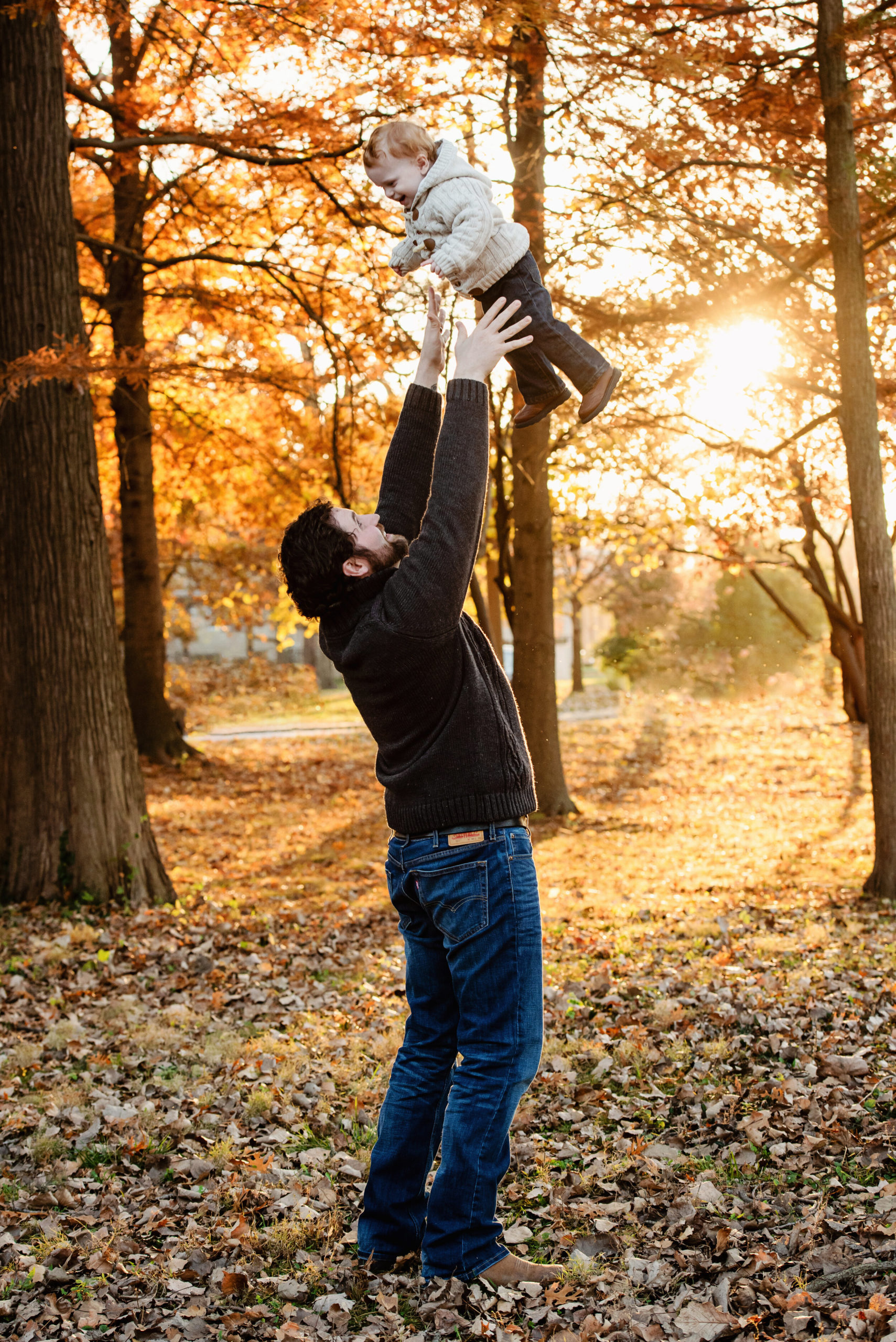 st-louis-family-fatherhood-photographer-fall-session-leaves-baby-kids-children.jpg